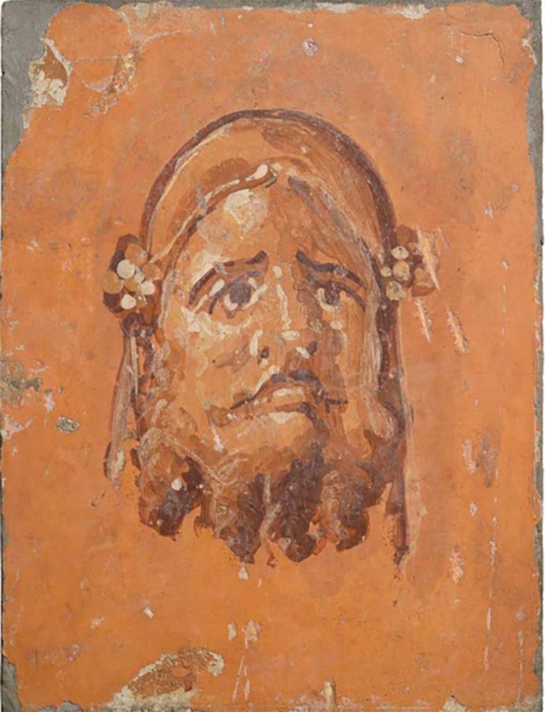 Villa dei Papiri, Herculaneum. Painted plaster fresco of head of Silenus. (26 x 19.5cm)
Now in Naples Archaeological Museum. Inventory number 8821A.
According to the Catalogue –
The above fresco, together with another two depicting monochrome heads floating on a yellow background have all been attributed to the Villa.
These were found between June 15th and June 22nd 1755.
See Catalogue (p.226-229) of exhibition entitled “Buried by Vesuvius, the Villa dei Papiri at Herculaneum”, edited by Kenneth Lapatin.